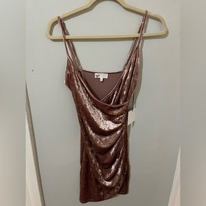 Pink velvet bodycon dress by the way